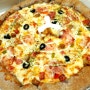 치즈의 쫄깃함이 살아있는 경남 진해 피자