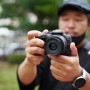 작고 가벼운 입문용 브이로그 카메라 캐논 EOS R10