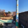 농협대학교 오래된 굴뚝에 시공된 페인트 도장과 대형벽화작업