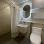 아이보리색 타일로 깔끔하게 시공된 김포 한강센트럴자이 욕실 시공 현장