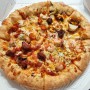 도미노 피자 50% 할인 '오징어 50그램 추가는 티가 안 나는군.'