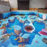 부천 웅진플레이도시 야외 온천 수영장에 바다 트릭아트 벽화를 제작했어요.