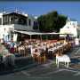 A Cafe in front of a Church